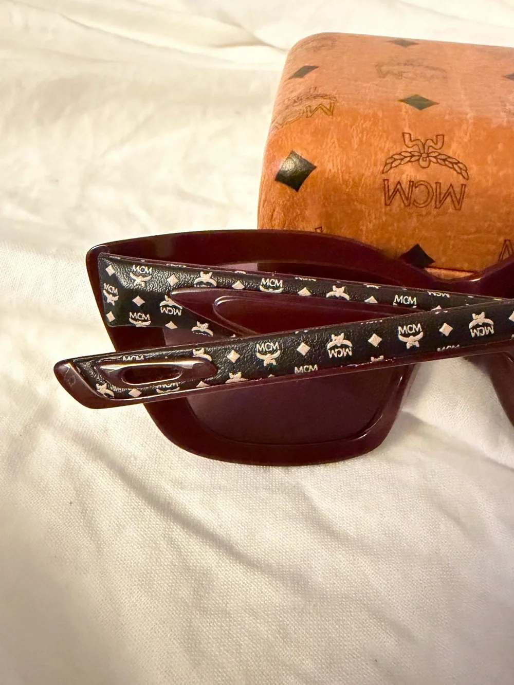 MCM MCM704SL 618 Sunglasses Women's Wine-Black Visetos/Red Lenses Cat Eye 52mm